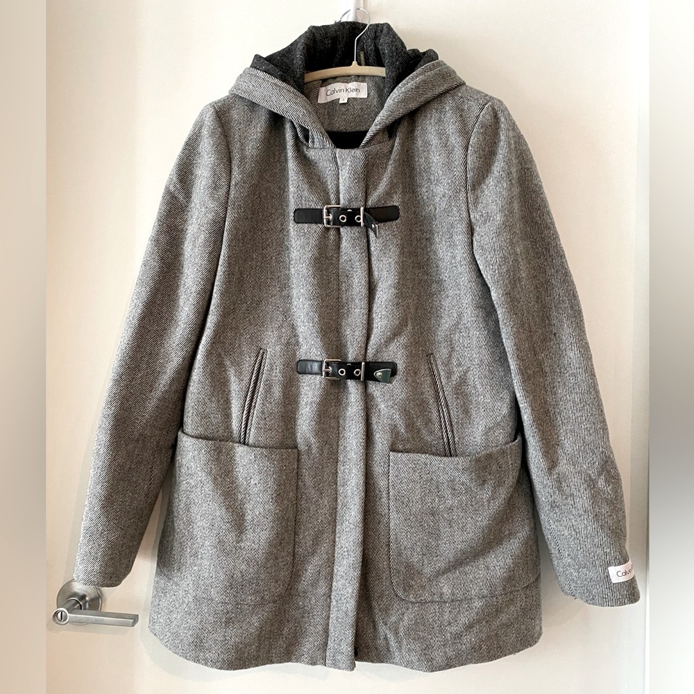Calvin Klein coat with buckles on the front